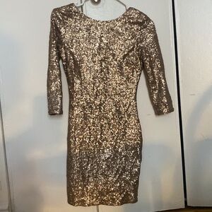 Backless gold sequin minidress